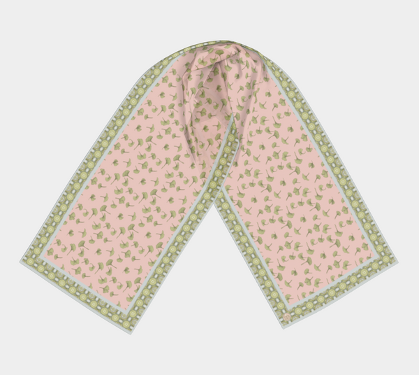 Long silk scarf with peachy pink background and green ginkgo leaves